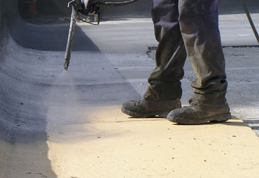 Coating systems over Worcester spray foam roof systems